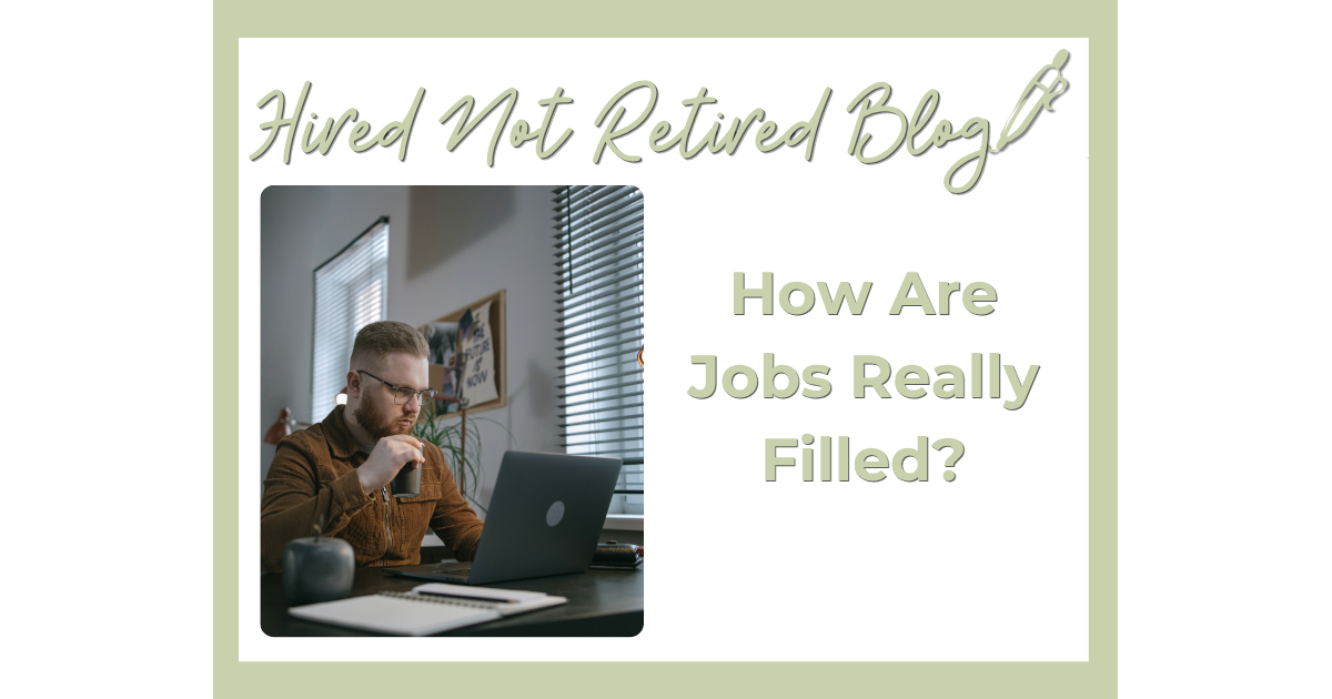 Person sitting at home with a laptop nearby, reflecting on a job search