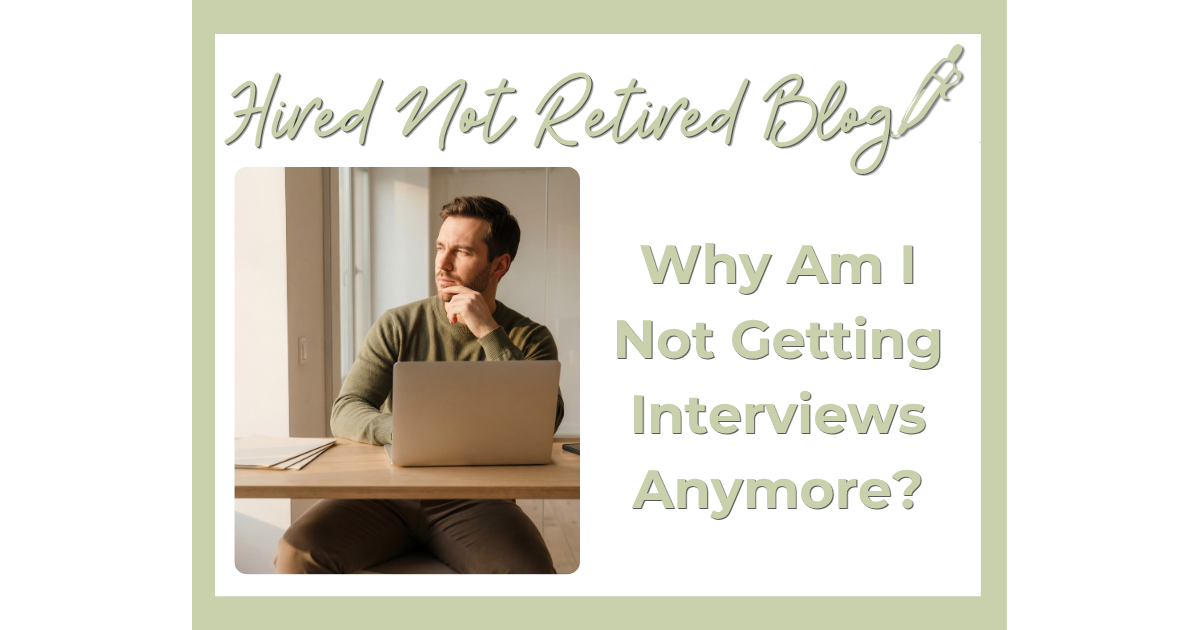 person sitting at their desk looking thoughtful